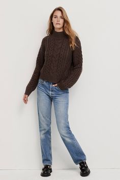 The stunning Avril chunky turtleneck sweater is accented with cable knit detailing throughout for an elevated look. Finished with thick ribbed trim and cropped bodice. 578 grams of 100% pure cashmere in 3-gauge knit Turtleneck pullover Cropped, relaxed fit 19 1/2" length (size small) Hand Wash Naked or Dry Clean Only Chunky Turtleneck, Chunky Turtleneck Sweater, Turtleneck Pullover, Knit Turtleneck, Small Hands, Cashmere Sweater, Turtleneck Sweater, Cable Knit, Bodice