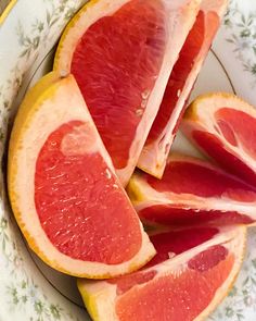 slices of grapefruit on a floral plate