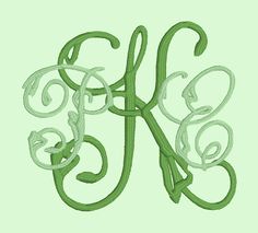 the letter k is made up of curly green thread