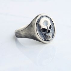 Silver skull handmade men ring. Inspired by the gothic style, handcrafted flawlessly You can buy this ring, which will attract all the attention thanks to its flawless handwork details, either 925 sterling silver or silver plated on white bronze.both materials are produced with the same craftsmanship and have the same appearance.This unique ring, which those who see it will look at again and cannot take their eyes off, will be packaged appropriately for gifting. MATERIALS: - Solid 925 sterling silver - White Bronze ( silver plated )  SHIPPING: - We use International P Shipping Service - 3-10 Business Days PACKAGING: -all your orders will be shipped with good packaging suitable for gifting Biker Skeleton, Vampire Skull, Dark Girl, Punk Men, Gothic Men, Handmade Skulls, Ring Inspired, Gothic Gifts, Skeleton Skull