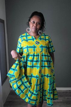 This roomy African print cotton summer dress will be one of your favorites this summer.  Fit: Relaxed Details:  - Dropped armholes - one button back closure - In seam side pockets Garments Measurements: MEDIUM Bust: 46 in Waist:  46 in Hips:  FREE Sleeve Length: 9 in Full Length: 42 in LARGE Bust: 48 in Waist:  48 in Hips:  FREE Sleeve Length: 9 in Full Length: 42 in READY TO SHIP IN 5 DAYS Machine Washable (cold with like colors suggested) and Dryer Safe  Hand wash is better to preserve the bri Cotton Dress Summer, Large Bust, Summer Cotton, Long Beach, Waxed Cotton, Easy Wear, Cotton Dresses, African Print, Printed Cotton