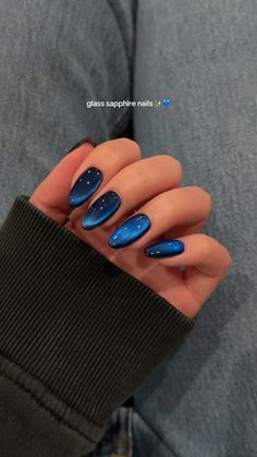 +23 Captivating Coffin Nail in 2024 You'll Want To Try This Season #nailart #naildesigns #nailinspiration #nailsofinstagram #nailgoals #nailtrends #nailfashion #nailswag #naillove #nailaddict Navy Blue Cat Eye Nails, Blue Theme Nails, Blue Nail Aesthetic, Navy Winter Nails, Navy Blue Acrylics, Dark Blue Almond Nails, Dark Blue Winter Nails, Navy Blue Nails Acrylic, Blue Holiday Nails