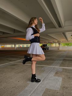 parking garage instagram photoshoot; trendy y2k classy sweater vest fall outfit Sweater Vest Outfit Photoshoot, White Retro Sweater Vest For Fall, Retro Sleeveless Sweater Vest For Fall, Fitted Retro Sweater Vest For Fall, Thanksgiving Outfit Sweater Vest, Classy Sweater, Fall Vest, Sweater Vest