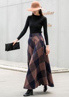 "This winter wool skirt is a classic piece of tailoring that will see you through rain or shine. It is cut with a flattering flared skirt to give you a wonderful shape. The winter skirt is perfect classic styling and ends at the ankle. This is a versatile skirt that you'll wear again and again. DETAILS: * More colors available https://etsy.me/3yfUD4P * 30% wool, 30% fiber, 40% polyester * fully satiny liner * Two side pockets * Right zip closure * Back elastic, comfortable wear * Plus size full Winter Wool Skirt, Warm Skirt, Long Skirt Winter, Wool Maxi Skirt, Long Wool Skirt, Maxi Skirt Winter, Warm Skirts, Long Linen Skirt, Chiffon White Dress