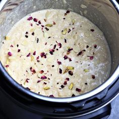 the food is being cooked in the crock pot