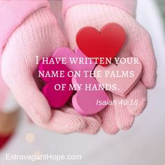 a person in pink gloves holding hearts with the words i have written your name on the palms of my hands