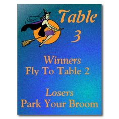 a sign that says, table 1 winners park your broom loses fly to table 3