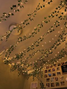 the ceiling is decorated with vines and lights