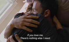 a man and woman hugging each other with a quote on the wall behind them that says, if you love me, there's nothing else i need