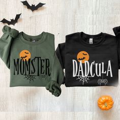 Looking for a Matching Family Halloween sweatshirts to wear on Halloween? We have these super cozy Momster and Dadcula Halloween Sweatshirts perfect for staying warm while trick or treating. Check out our other listings for matching kids and grandparents shirts.    Our graphic sweatshirts are very soft, very cute and bound to keep you warm in the colder months. It's a pre-shrunk, classic fit sweater made with air-jet spun yarn for a soft feel.  ► SHIRT DETAILS The Gildan sweatshirts are UNISEX - they are meant to have a relaxed fit, please refer to the size chart for more details. * 8.0 oz., 50/50 cotton/polyester * Pre-shrunk * Classic fit * Reduced pilling and softer air-jet spun yarn * 1x1 athletic rib knit collar, cuffs and waistband, with spandex * Double-needle stitched collar, shoul Mummy And Dadcula, Dadcula Halloween Shirt, Black Themed Long Sleeve T-shirt, Funny Crew Neck Sweatshirt For Halloween, Momster Halloween Shirt, Grandparents Shirts, Family Halloween Shirts, Grandparents Shirt, Halloween Matching