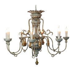 a chandelier with five lit candles hanging from it