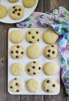 chocolate chip cookies are arranged on a white tray