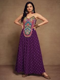 Our exquisite purple georgette palazzo is adorned with intricate threadwork. This palazzo exudes sophistication and charm, with its flowing silhouette and rich purple hue. Crafted from high-quality georgette fabric, it promises both comfort and style, making it a perfect choice for various occasions.
Complementing this palazzo is a stunning multi-color art silk crop top, meticulously embellished with beads work, threadwork, and handwork. The vibrant colors and exquisite detailing add a touch of Crop Top Palazzo, Top With Palazzo, Designer Crop Top, Georgette Palazzo, Lehenga Crop Top, Indian Bridal Sarees, Lehenga Choli Wedding, Floral Lehenga, Silk Crop Top