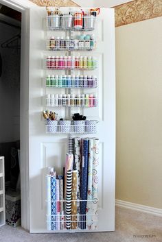 an organized craft closet is shown in this photo