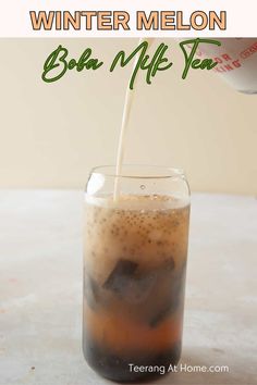 an iced drink in a tall glass with a straw being poured into it and the words winter melon boo miff tea