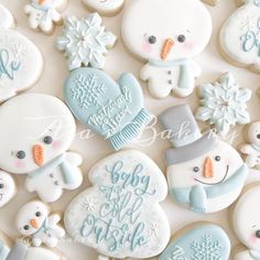 cookies decorated with frosting and icing are arranged in the shape of snowmen