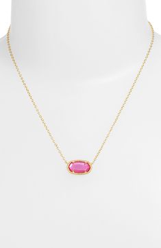 A lustrous doublet with a ridged frame brings a pretty pop of color to a geometric pendant necklace plated in glossy 14-karat gold. 19" length; 3/8"W x 3/4"L pendant Due to natural variation, stone or shell color may vary 14k-gold plate/glass/mother-of-pearl Imported Prince James, 13th Birthday Gifts, Kendra Scott Elisa, Geometric Pendant Necklace, Bday Wishlist, Birthday Wishes For Myself, Shell Color, Preppy Room