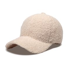 a white baseball cap with a visor on the front and side, made out of sheep fur