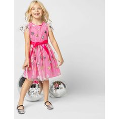 Our best-selling Aster Sequin Star Tulle Girls Party Dress, in Pink, is perfect for parties, the Holidays, Christmas, New Years celebrations, family photos, parties, prom, special occasions, ceremonies, flower girls & birthdays! The Aster dress is embroidered with twinkling stars, made of sequins in gold and silver on a fine fluid tulle, lined with a bright pink, silky fabric. The Aster dress is a fluid loose fit with a swirly skirt and a comfortable loose waist. The Aster dress has an easy zip Party Dress Pink, Girls Designer Dresses, Designer Party Dresses, Exclusive Dress, Holidays Christmas, Girls Party Dress, Girls Party, Flower Girls, Pink Satin