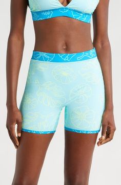 A reversible design doubles your styling opportunities in these effortless swim shorts made with built-in sun protection and a stretchy, stay-put fit. Elastic waist UPF 50+ sun protection 80% recycled polyester, 20% spandex Machine wash, tumble dry Imported Casual Stretch Activewear For Surfing, Warm Weather Swimwear With Built-in Shorts, Athleisure Sports Bottoms With Upf 50+, Blue Activewear For Summer Surfing, Stretch Short Swimwear For Surfing, Casual Swim Trunks With Uv Protection For Sports, Athleisure Swim Trunks With Built-in Shorts For Surfing, Beach Season Sports Stretch Shorts, Summer Beachwear Activewear With Built-in Shorts