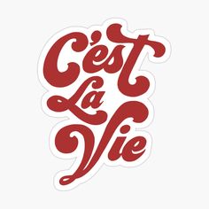 red sticker with the words cet la vie on it in cursive font