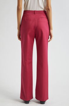 Look impeccable from one meeting to the next in these polished cotton-blend pants designed with flared legs. Zip fly with hook-and-bar closure Front slant pockets; back welt pockets 56% cotton, 40% viscose, 4% elastane Dry clean Imported Cotton Wide Leg Pants With Straight Hem, Classic Flare Pants With Pockets, Elegant Red Cotton Bottoms, Elegant Red Flare Bottoms, Pants Design, Flare Pants, Welt Pockets, Emporio Armani, Dark Red