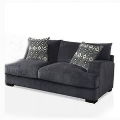 a gray couch with two pillows on it