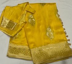 Gorgeous Combination Yellow Color Munga Benarasi Crepesilk Saree - Blouse Size 38 Extends to44. Ready to ship from Texas, USA! Disclaimer : There might be little color variation because of photography and gadget settings, Zari Folding's and Thread Outcomes are not considered as Damage. For any questions please message +1 (832) 497-6149 Traditional Slub Silk Blouse Piece With Gota Work, Gold Silk Blouse Piece With Gota Work, Yellow Silk Blouse Piece With Gota Work, Yellow Silk Blouse With Self Design, Transitional Gold Slub Silk Blouse Piece, Gold Blouse With Dupatta For Puja, Gold Silk Sets For Puja, Yellow Silk Blouse Piece, Transitional Yellow Silk Blouse Piece