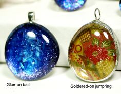 three glass pendants with different designs on them