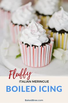 some cupcakes with white frosting on them and the words fluffy italian merigue boiled icing