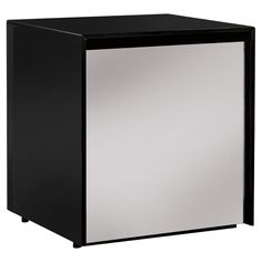 a black and white cabinet with mirrored doors