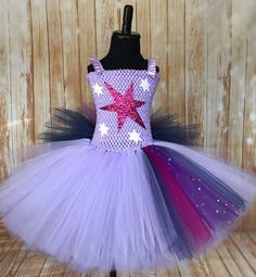 FREE SHIPPING on all orders within the US, no coupon code needed! Twilight Sparkle Tutu by Little Ladybug Tutus. Handmade Tutus for girls specializing in birthday party dresses, Halloween costumes, flower girl dresses, pageant tutus, 1st birthday tutus, and blinged Converse sneakers. We accept custom orders! ORDER PRODUCTION TIME Please check the top of our website's home page for current turn around time. Since all items are handmade at the time of purchase, there is a production time that vari Cute Purple Tutu Dress For Birthday, Purple Cute Tutu Dress For Birthday, Purple Tutu Dress For Summer Costume Party, Purple Tutu Dress For Costume Party In Summer, Purple Whimsical Tutu Dress For Costume Party, Playful Purple Tutu Dress For Birthday, Cute Purple Tutu Dress For Costume Party, Whimsical Purple Tutu Dress For Dress-up, Twilight Sparkle Costume