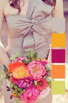 a woman holding a bouquet of flowers in her hands and wearing a dress with a bow on it