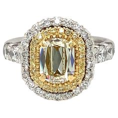 a fancy yellow and white diamond ring