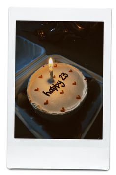 a birthday cake with the word happy written on it