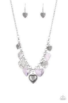 Featuring an array of floral patterns, a collection of silver hearts swings from the bottom of a shimmery silver chain. Alternating charms are brushed in a minty green finish, creating a colorful fringe below the collar. Features an adjustable clasp closure. Sold as one individual necklace. Includes one pair of matching earrings. Get The Complete Look!Bracelet: "Garden Hearts" (Sold Separately)