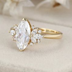 a ring with three pear shaped diamonds on it