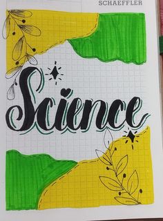 an open book with the word science written on it in black and green ink next to a pencil