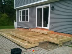 a house that is being built with wood