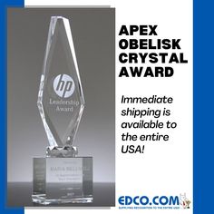 an award is presented in front of a gray background with the words, apex obelisk crystal award immediate shipping is available to the entire usa