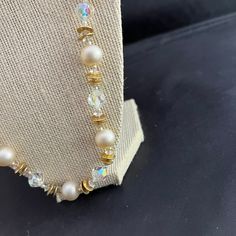 This listing is for a beautiful necklace by Vendome.  The necklace is made with gold metal discs, cream glass pearls, and clear faceted glass beads. Size:  Approximately 24" in length Condition:  Good condition for being vintage Want to purchase 3 or more items from my shop?  Please use the following coupon when you check out to receive 20% off! https://www.etsy.com/shop/elsysvintage?coupon=ELSYSDISCOUNT *Please be aware the items I am selling are vintage, which means they are old and with anyth Vintage Round Beaded Crystal Necklaces, Vintage Beaded Round Crystal Necklaces, Vintage Beaded Crystal Necklaces, Beaded Pearl Crystal Necklace For Party, Pearl Beaded Crystal Necklace For Party, Party Pearl Beaded Crystal Necklace, Vintage Beaded Pearl Necklace For Party, Vintage Adjustable Pearl Necklace With Round Beads, Adjustable Vintage Pearl Necklace With Round Beads