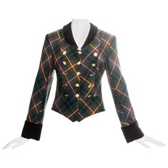 Vivienne Westwood green tartan wool fitted jacket with 15 gold orb button fastenings at front. Black velvet cuffs and collar. Fall-Winter 1988 Vivienne Westwood Jacket, Black Shearling Coat, Black Vivienne Westwood, Vivienne Westwood Logo, 1980s Jacket, A Game Of Clothes, Faux Fur Cropped Jacket, Game Of Clothes, Green Tartan