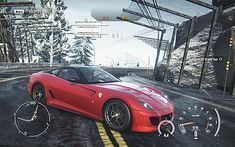 a red sports car driving down a street next to a snow covered forest and power lines