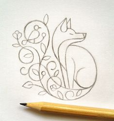 a pencil drawing of a fox on paper