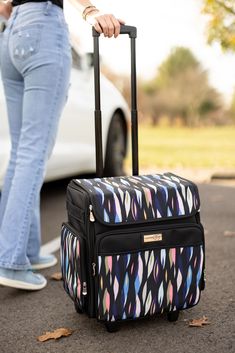 "Buy the Everything Mary Black Abstract Stripes Rolling Craft Bag at Michaels. com. This scrapbook rolling tote features a telescoping locking handle and a durable wheelset for secure craft storage. The Everything Mary Collapsible Rolling Craft Bag was made with crafters in mind. The Everything Mary Collapsible Rolling Craft Bag is the ultimate storage solution for any storage need you may have. This rolling organizer cart is constructed with durable polyester and features premium zippers, pipin Organization Cart, Rolling Tote, Wheel Carrier, Rolling Bag, Teacher Tote, Coloring Supplies, Craft Tote Bag, Tote Storage, Craft Bags