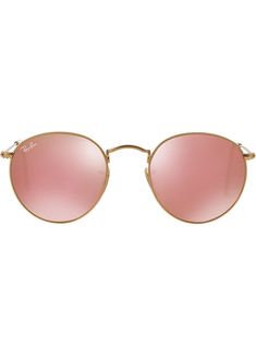 Gold-tone Round Metal sunglasses from Ray-Ban featuring straight arms with angled tips, pink lenses, a curved brow bar, adjustable nose pads and clear acetate tips. Classic Pink Sunglasses With Mirrored Lenses, Gold Round Frame Sunglasses With Anti-reflective Coating, Gold Round Sunglasses With Polarized Lenses, Gold Round Sunglasses With Gradient Lenses, Gold Round Sunglasses With Tinted Lenses, Gold Round Frame Anti-reflective Sunglasses, Pink Sunglasses With Mirrored Lenses And Round Frame, Pink Round Frame Sunglasses With Mirrored Lenses, Classic Pink Sunglasses With Uva Protection