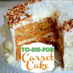 a carrot cake with white frosting and chopped nuts on top is cut in half