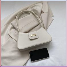 Magnetic Buckle Solid Color Handbag French Crossbody Bag Simple Shoulder Bags   Product name: French solid color popular high-end handbag Color: as shown in the picture Material: PU Applicable users: women Size: 28*14.5*6.5cm, handle 26.5cm 100% brand new, high quality Package includes: 1x handbag notes: 1. Due to the influence of light and display, the color may vary slightly. 2. Please allow slight size errors due to manual measurement. Thank you for your understanding! 3.1 centimeters = 0.39 inches. * Please make payment asap, then we can arrange shipment for you asap. - Thanks for your bid * We will arrange shipping for you within 24 Hours after payment cleared except the holidays. * If you have changed your address, or want us to ship to another address, please change to the new addre Chic Travel Outfit, High End Handbags, Fashionable Bags, Crossbody Bag Fashion, Armpit Bag, High Fashion Editorial, Activewear Fashion