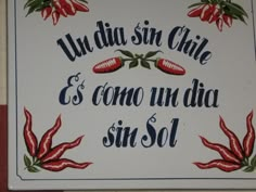 a sign on the side of a building that says, una da sin chile e como unida sin sol