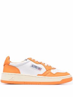 Orange/white leather Action Medalist low-top sneakers from Autry featuring round toe, front lace-up fastening, perforated detailing, panelled design, embroidered logo to the side, branded heel counter and flat rubber sole. Clog Boots, Bag Women Fashion, New Sneakers, Outdoor Outfit, Orange White, Lace Boots, Saucony Sneaker, Sneakers For Sale, Sneakers White